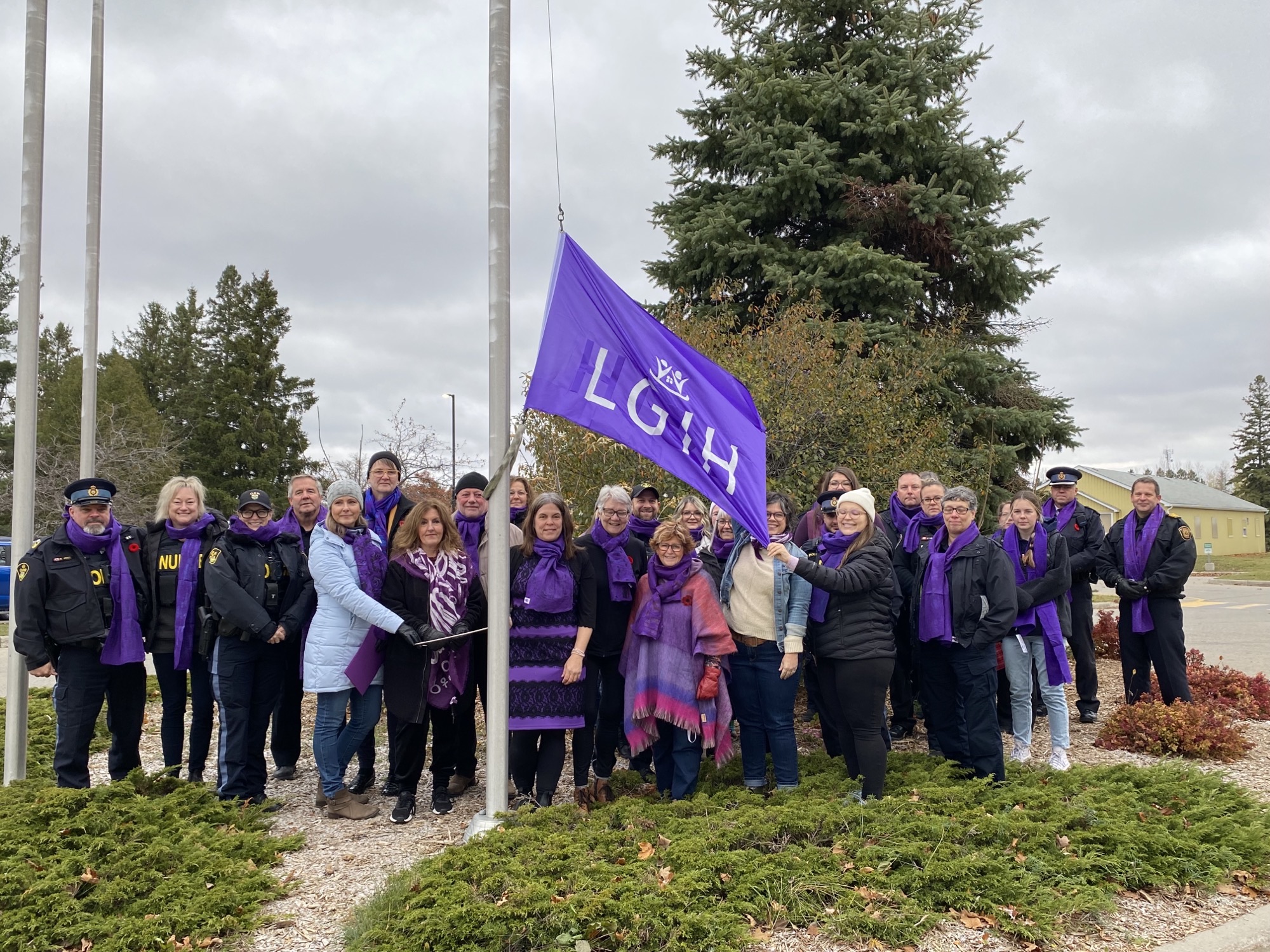 Leeds Grenville Interval House Flag Raising with members of Council, OPP and Victim Services 