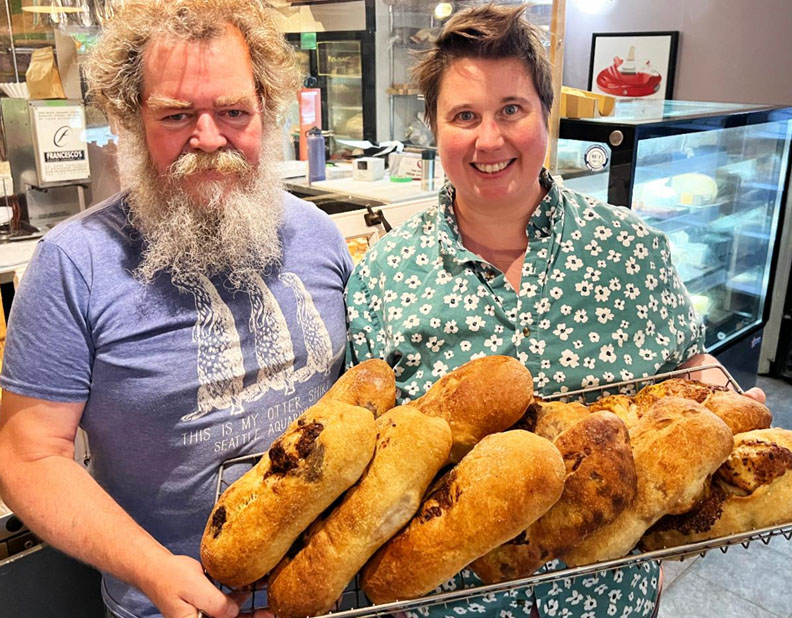 The Crusty Bakers are owner Jon Levett and Jamie LaBrash, master baker and chef, shown here with some tasty breads