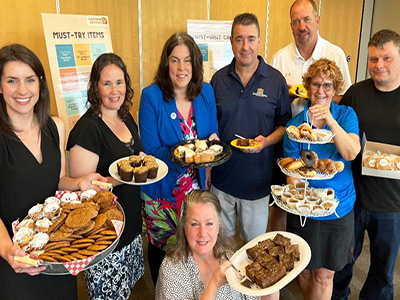 From left to right: Leeds Grenville Economic Development Office team members Shelbi McFarlane and Joanne Poll, Warden Nancy Peckford, Patti Johnson (foreground) Brent Murray, Rick Taylor, Deb Wilson and Jeff Day.