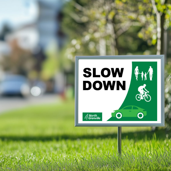 Slow down lawn sign
