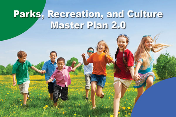 Children running carefree and happy through a field